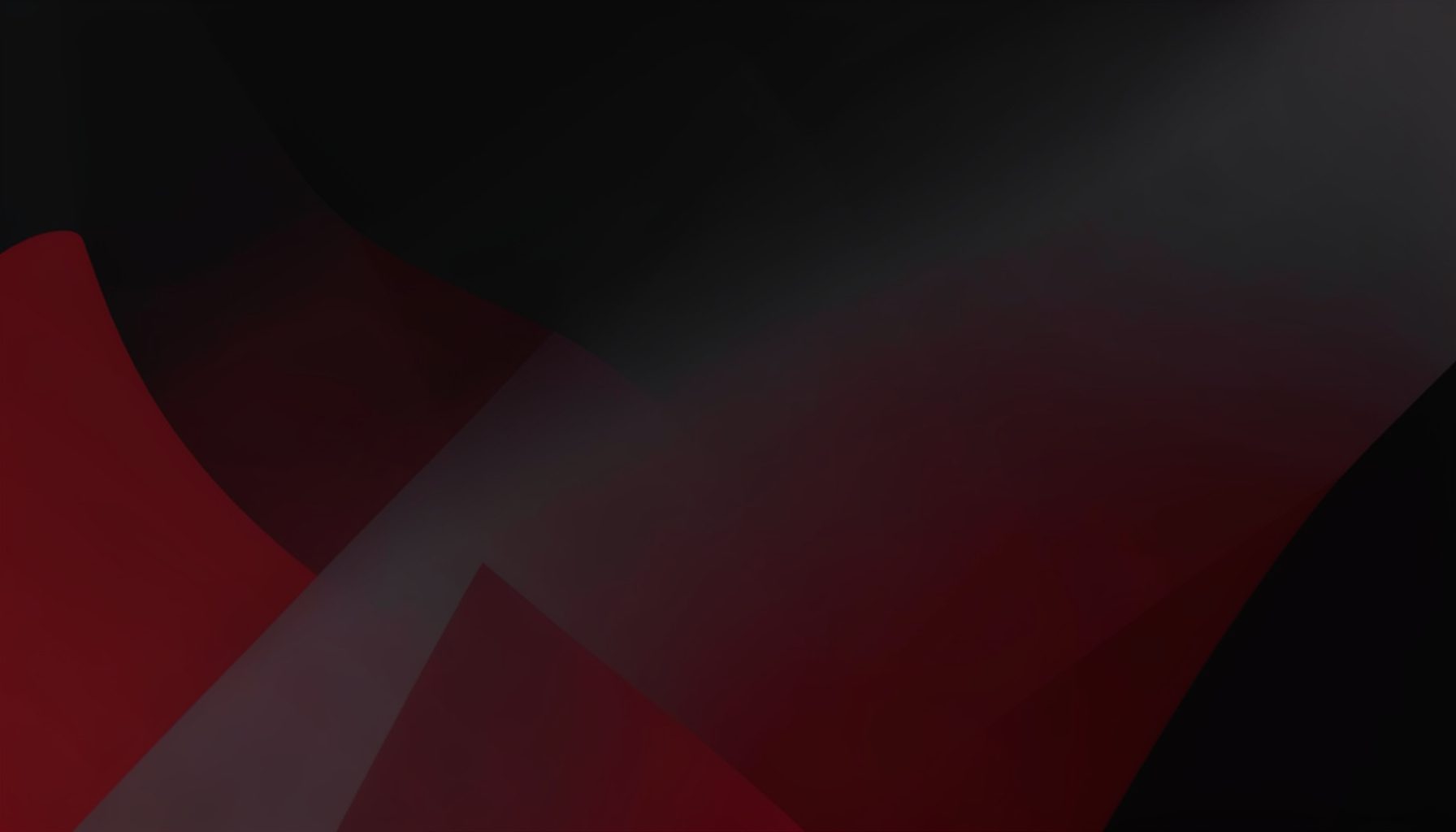 Muted black and grey abstract gradient composition with soft angular shapes